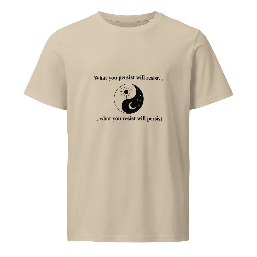 Desert-dust beige organic cotton t-shirt with a yin‑yang graphic and the quote "What you persist will resist... what you resist will persist" on the front.